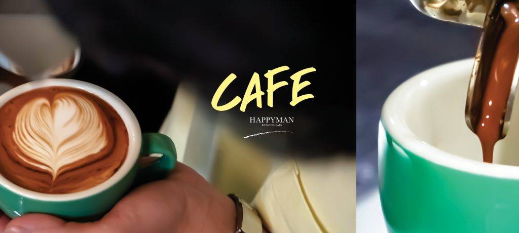 Cup of coffee from Happyman Cafe, near a burger restaurant in Kata Beach